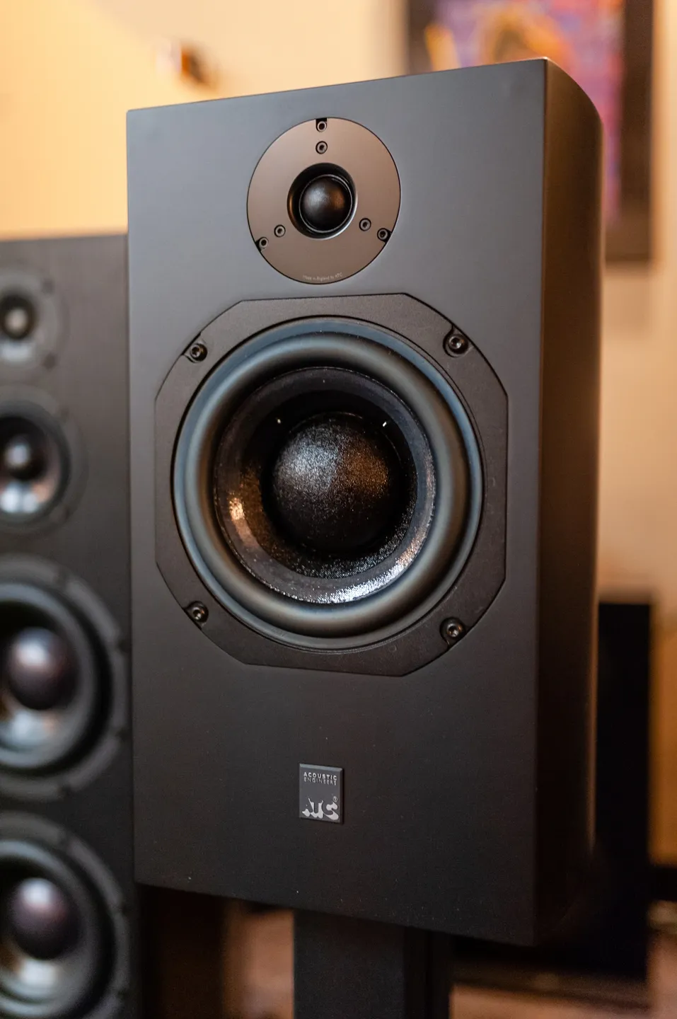 A close up of the front speakers of two speakers