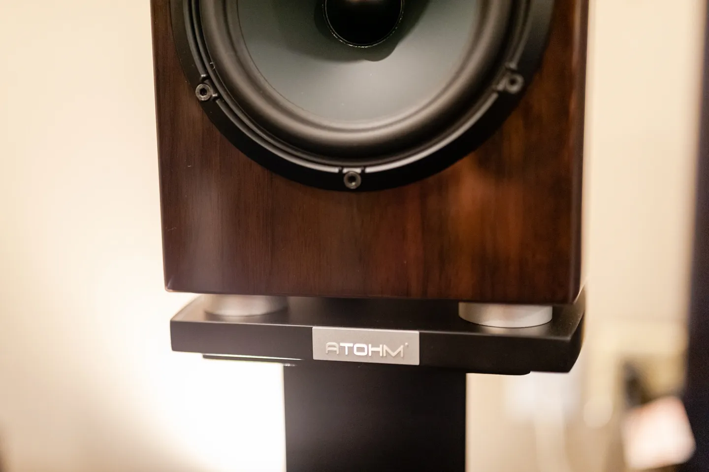 A speaker on top of a stand