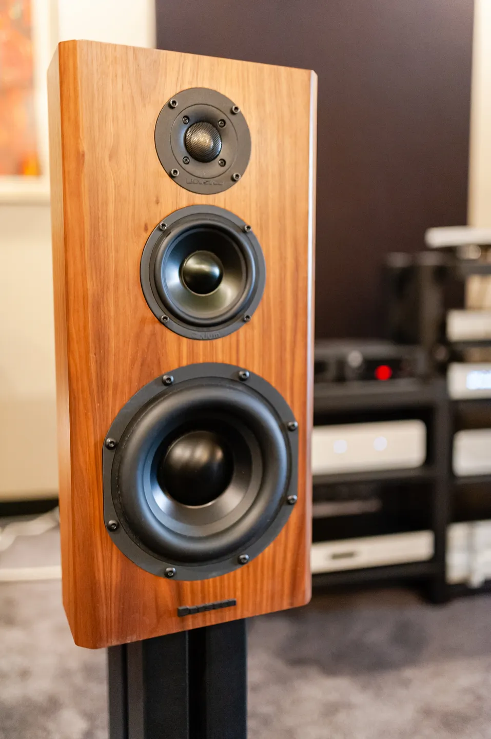 A close up of the front speakers on a speaker system.
