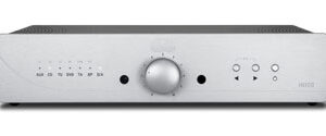 A silver stereo with knobs and buttons.