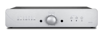 A silver stereo with knobs and buttons.