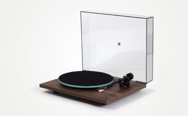 A record player with the lid open and its turntable on top.