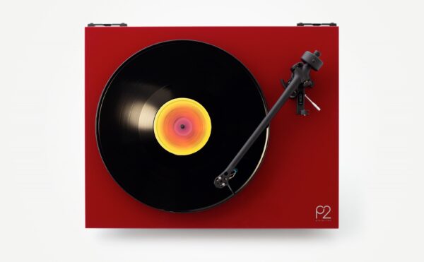 A record player with the lid open and a record on it.